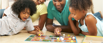 photographs adults playing a board game 